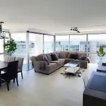 Luxury Beach-Front High-Rise Apartment