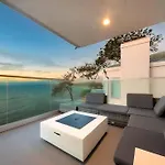 Cliffside Haven Where Ocean Meets Sky